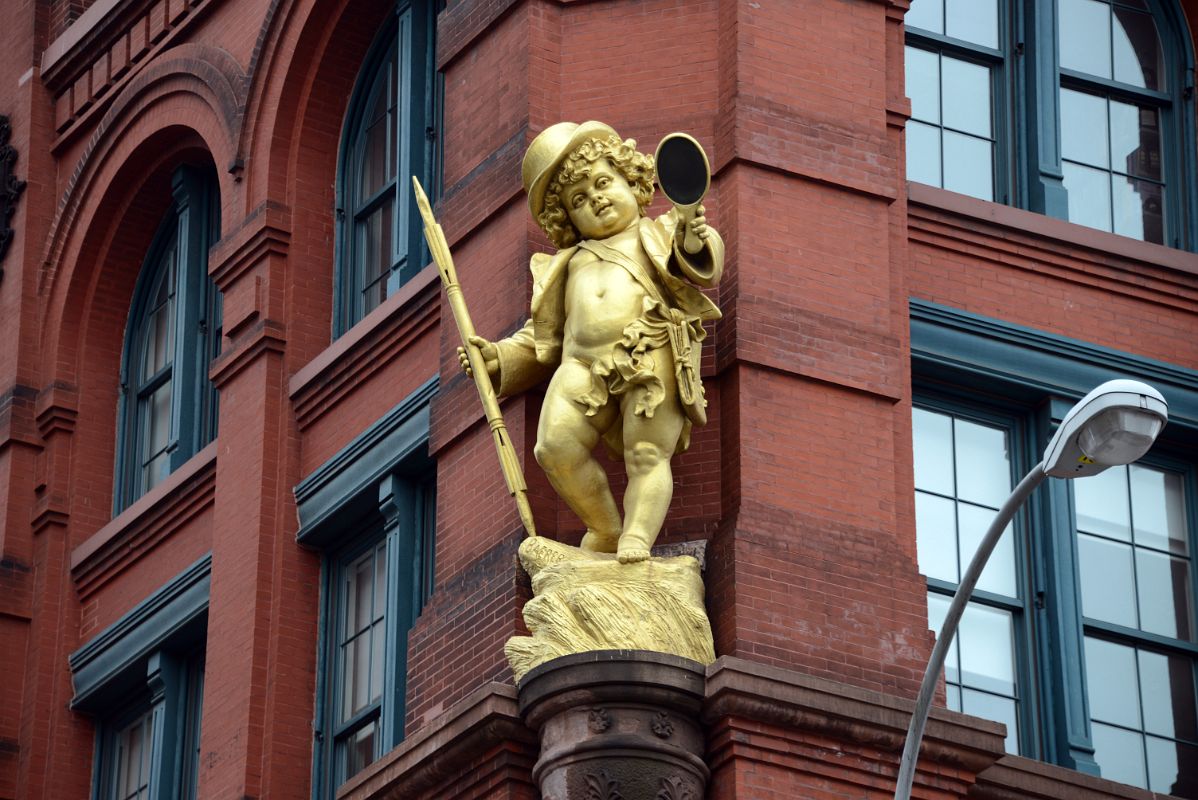 17-2 Gilded Statue By Sculptor Henry Baerer of Shakespeare Character Puck From A Midsummers Night Dream On The Puck Building 295-307 Lafayette St In Nolita New York City